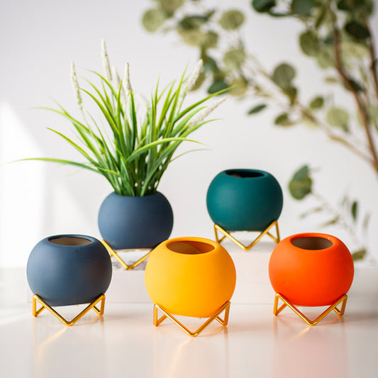 teal ceramic vase with gold tripod stand home decor