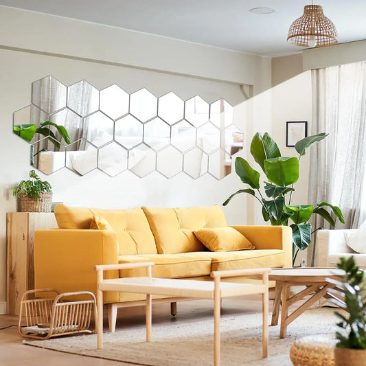 Hexagon mirror wall stickers arranged above sofa in modern living room decor